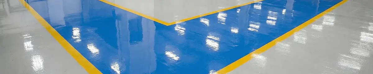 A factory floor professionally covered and marked with epoxy flooring in Saint Petersburg, FL