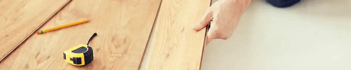 A professional installing wood flooring in Saint Petersburg, FL