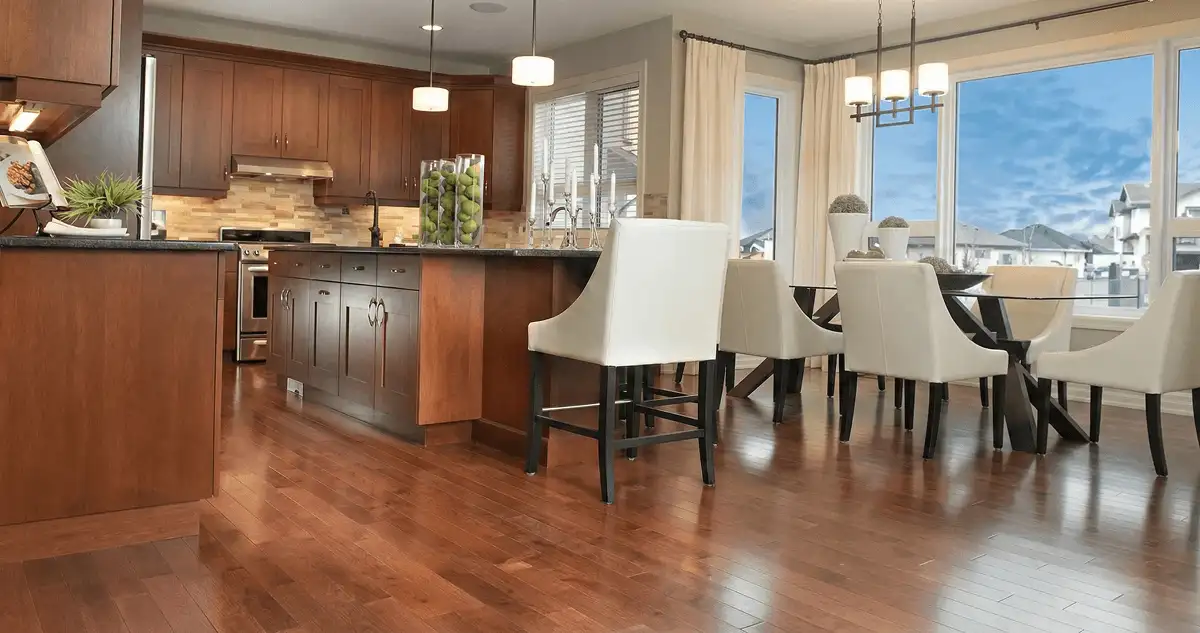 A modern kitchen with professionally installed wood flooring in Saint Petersburg, FL