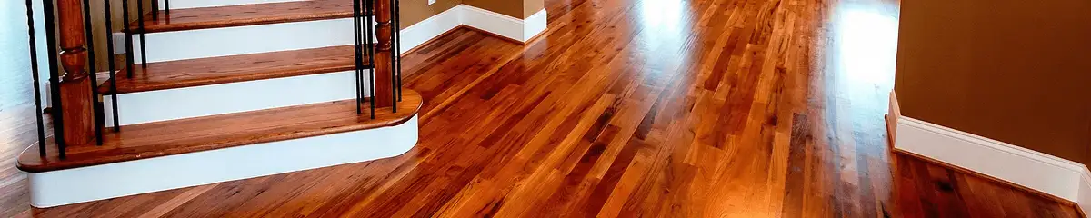 Base floor of a staircase with professionally restored wood flooring in Saint Petersburg FL