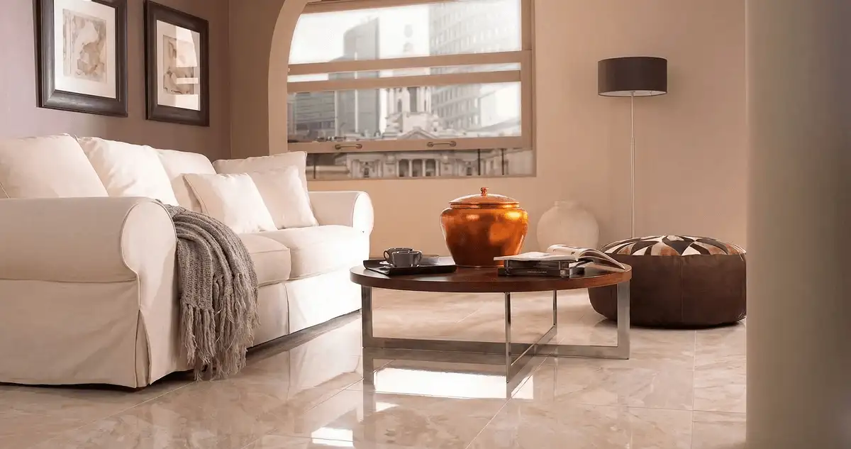Modern living room with professionally installed marble flooring, a beige sofa, coffee table in Saint Petersburg, FL
