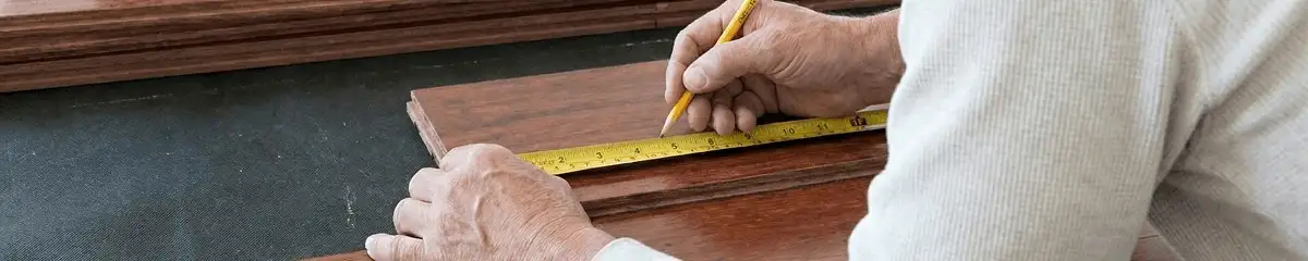 A professional installing wood flooring in Saint Petersburg, FL